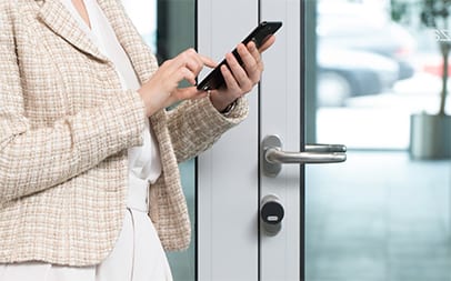 An example of a smart lock being opened by a mobile phone